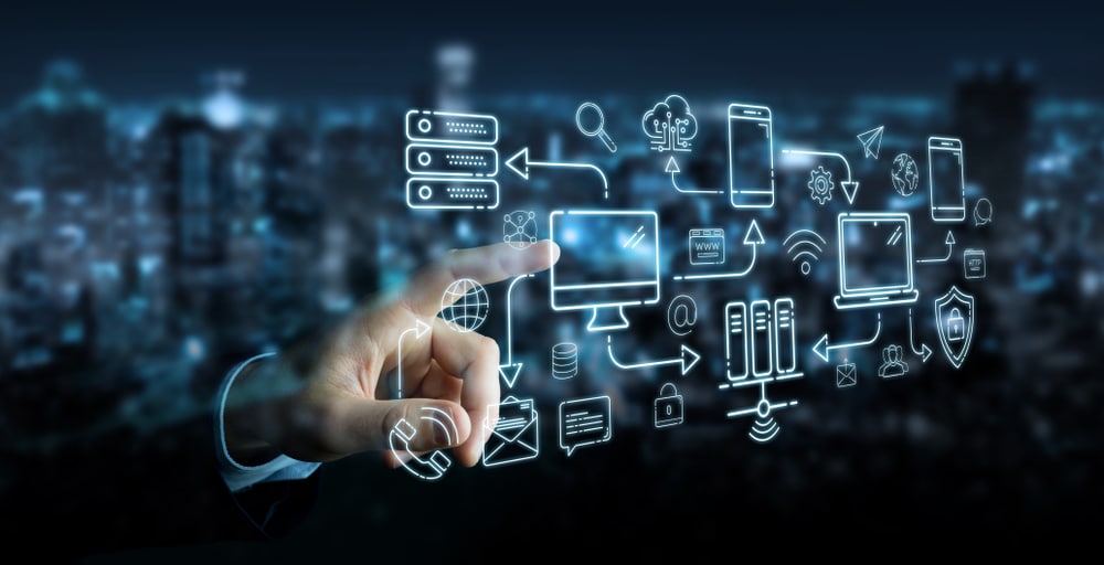 Businessman,On,Blurred,Background,Using,Tech,Devices,And,Icons,Thin